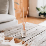 Diffuser on a wooden surface with a blurred background